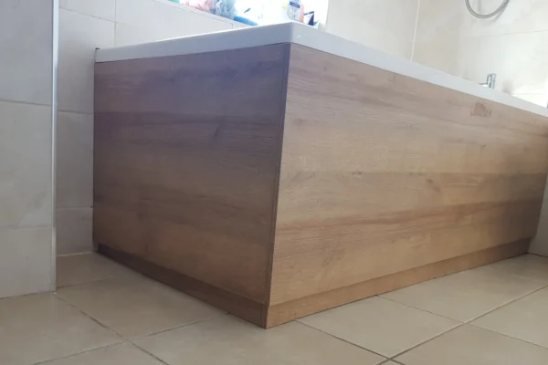 bath with woodgrain effect panels installed